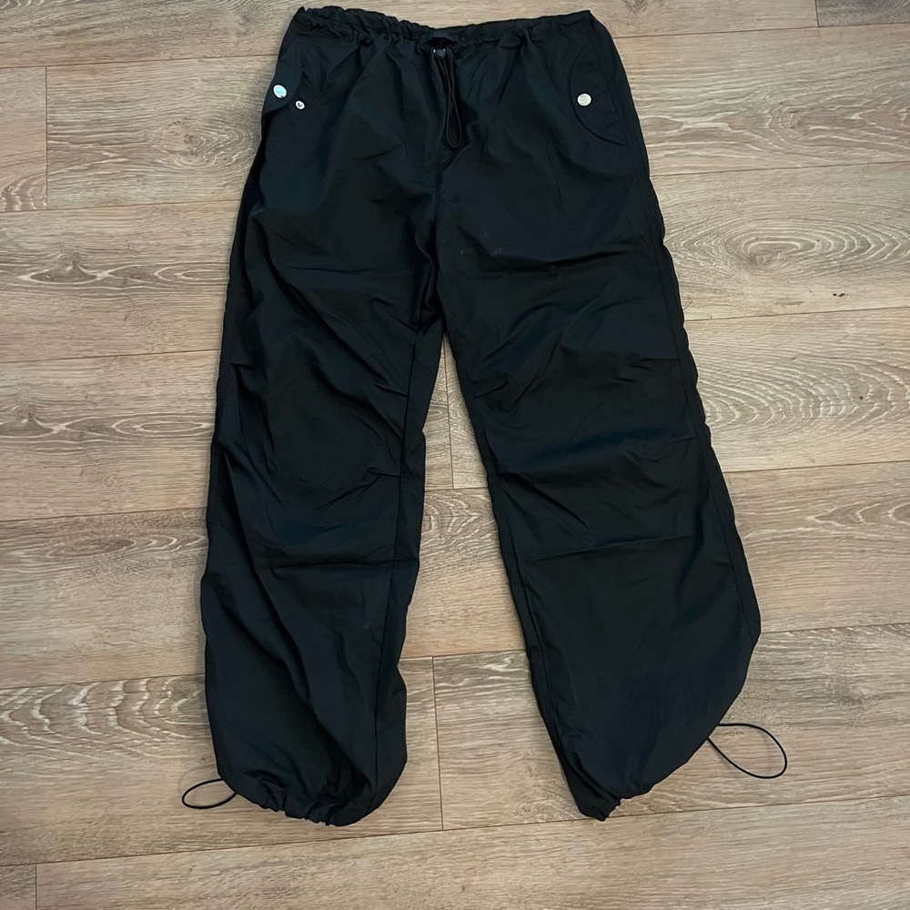 Black parachute pants